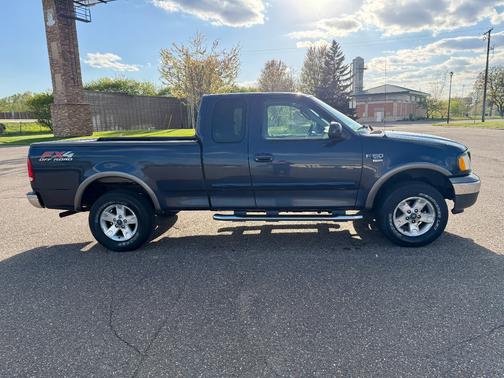 Blue 2003 Ford F-150 XLT