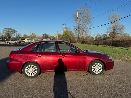 Red 2010 Subaru Impreza 2.5 i Premium