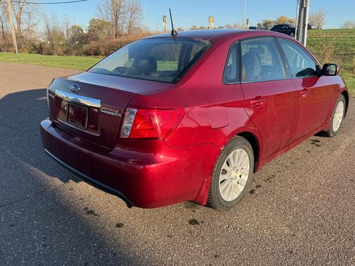 Red 2010 Subaru Impreza 2.5 i Premium