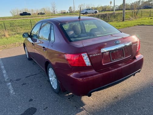 Red 2010 Subaru Impreza 2.5 i Premium