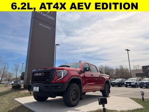 Volcanic Red Tintcoat 2024 GMC Sierra 1500 AT4X