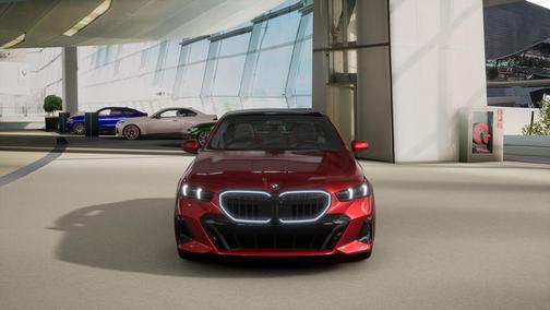 Vegas Red Metallic 2026 BMW 550e xDrive