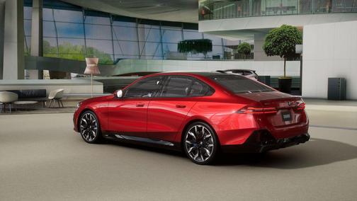 Vegas Red Metallic 2026 BMW 550e xDrive