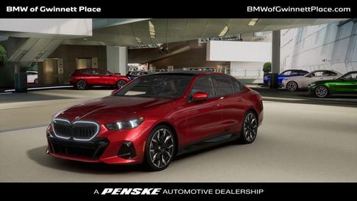 Vegas Red Metallic 2026 BMW 550e xDrive Sedan