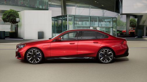 Vegas Red Metallic 2026 BMW 550e xDrive