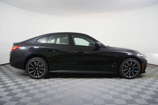 Black Sapphire Metallic 2026 BMW i4 Gran Coupe xDrive40