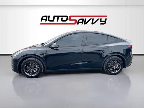 Solid Black 2025 Tesla Model Y Long Range Dual Motor Rear-Wheel Drive