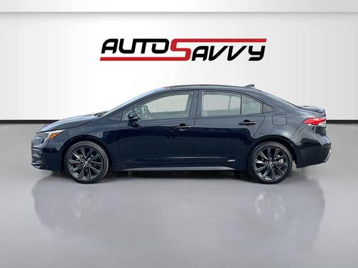 Midnight Black Metallic 2025 Toyota Corolla Hybrid SE