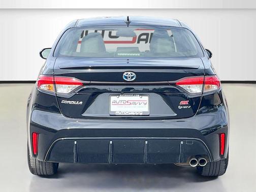 Midnight Black Metallic 2025 Toyota Corolla Hybrid SE