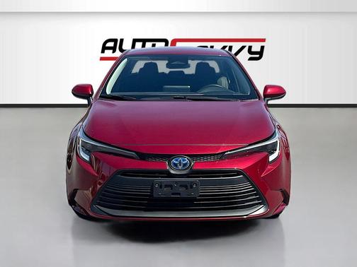 Ruby Flare Pearl 2025 Toyota Corolla Hybrid LE