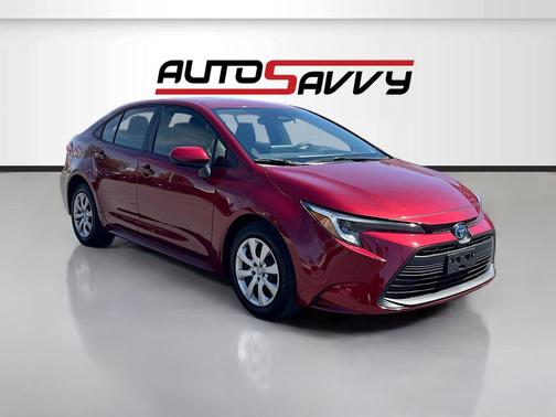 Ruby Flare Pearl 2025 Toyota Corolla Hybrid LE