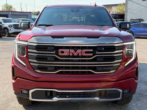 Volcanic Red Tintcoat 2024 GMC Sierra 1500 AT4