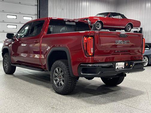 Volcanic Red Tintcoat 2026 GMC Sierra 1500 AT4X