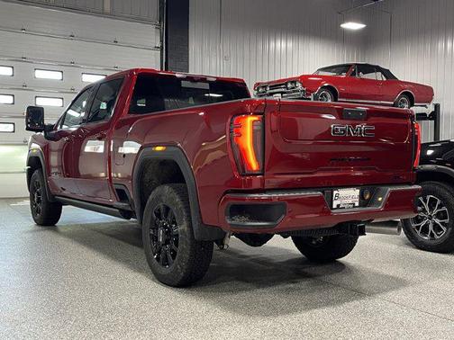 Volcanic Red Tintcoat 2026 GMC Sierra 2500 AT4