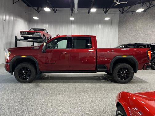 Volcanic Red Tintcoat 2026 GMC Sierra 2500 AT4