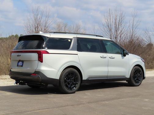 Ivory Silver 2026 Kia Carnival SX