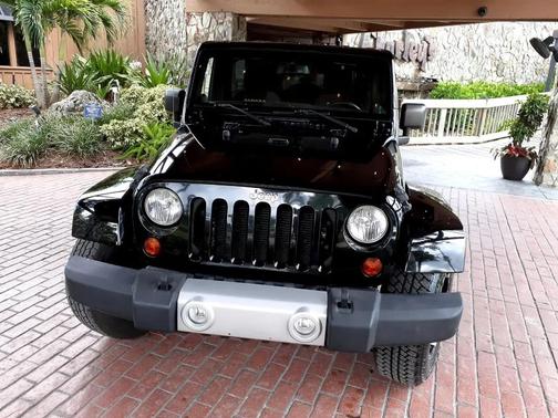 Black 2013 Jeep Wrangler Unlimited Sahara