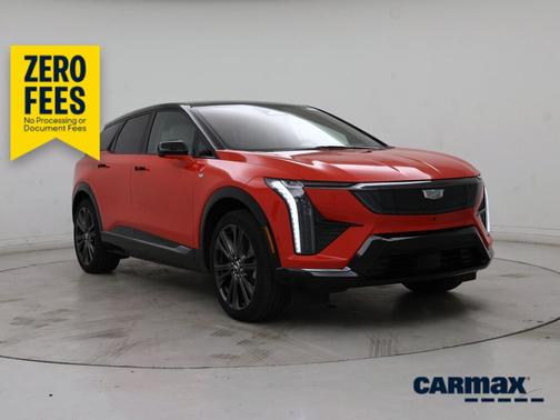 Orange 2026 Cadillac OPTIQ Premium Sport
