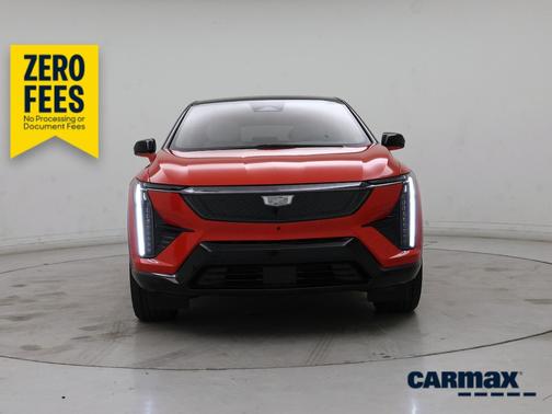 Orange 2026 Cadillac OPTIQ Premium Sport