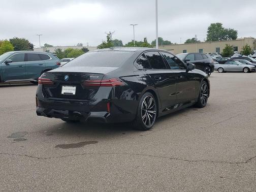 Black Sapphire Metallic 2026 BMW 550e xDrive
