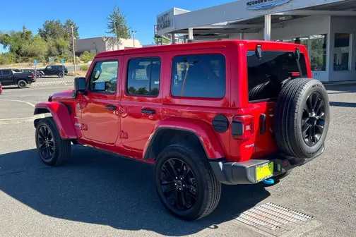 Red 2024 Jeep Wrangler Sahara 4xe