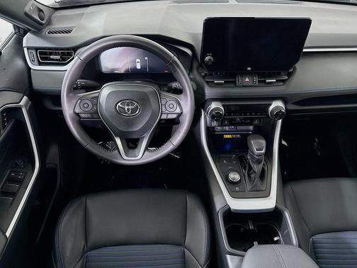 Silver Sky Metallic/Midnight Black Metallic 2024 Toyota RAV4 Hybrid SE