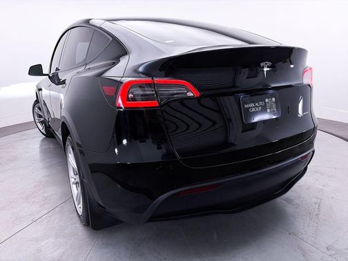 Solid Black 2024 Tesla Model Y Long Range Dual Motor All-Wheel Drive