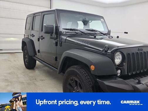 Black 2015 Jeep Wrangler Unlimited Willys Wheeler