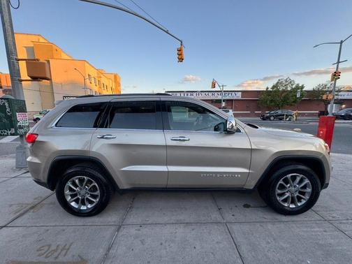 Tan 2015 Jeep Grand Cherokee Limited