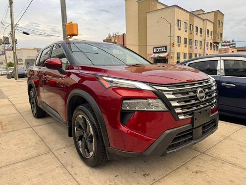 Red 2025 Nissan Rogue SV