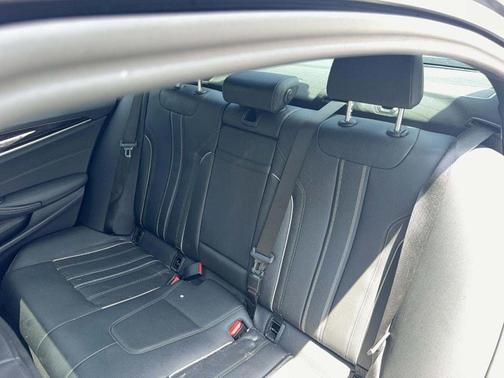 Gray 2023 BMW 540 i