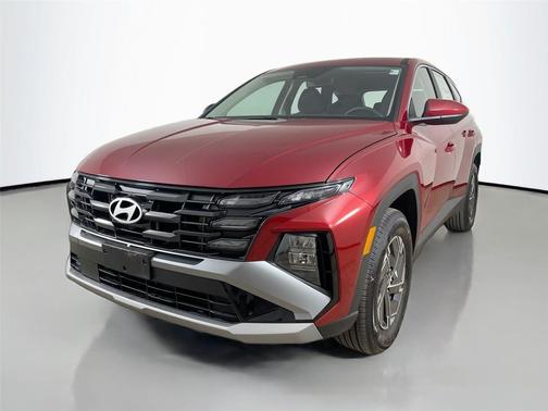Ultimate Red 2026 Hyundai TUCSON Hybrid Blue SE
