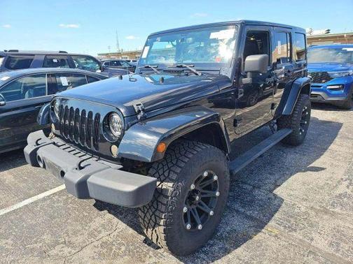 Black 2014 Jeep Wrangler Unlimited Sahara
