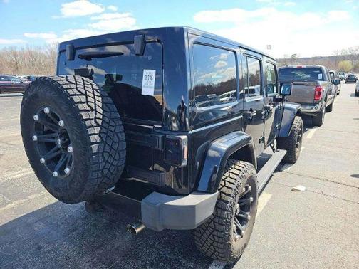 Black 2014 Jeep Wrangler Unlimited Sahara