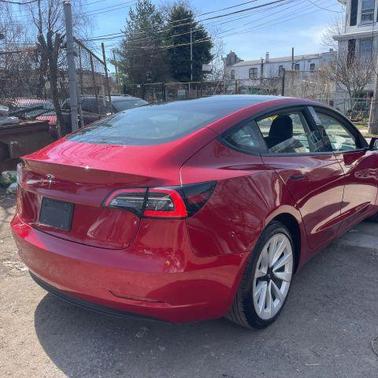 Red 2022 Tesla Model 3 Base