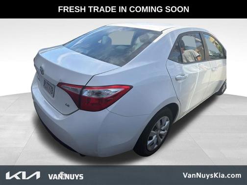 Super White 2016 Toyota Corolla LE