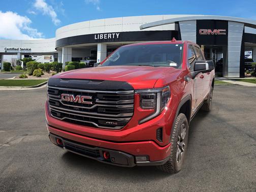 Volcanic Red Tintcoat 2026 GMC Sierra 1500 AT4