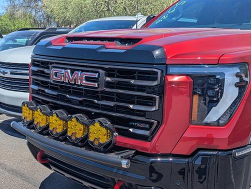 Volcanic Red Tintcoat 2025 GMC Sierra 2500 AT4X