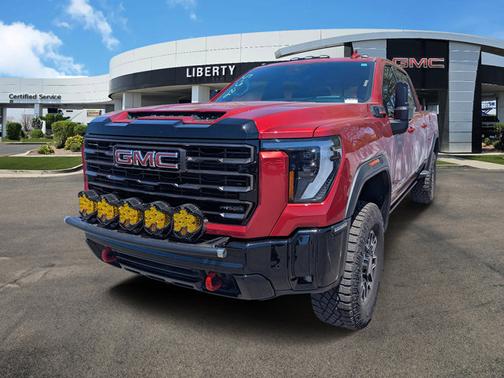 Volcanic Red Tintcoat 2025 GMC Sierra 2500 AT4X