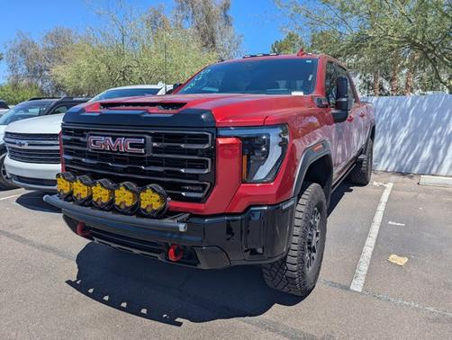 Volcanic Red Tintcoat 2025 GMC Sierra 2500 AT4X