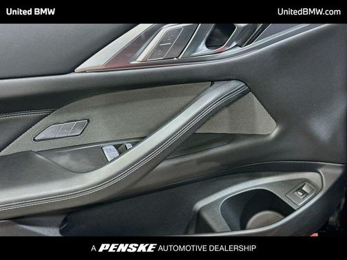 Black Sapphire Metallic 2025 BMW M4 Competition xDrive