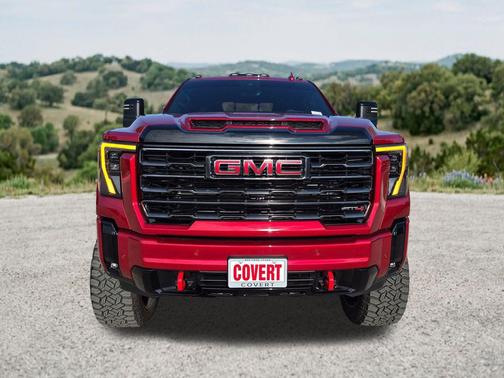 Volcanic Red Tintcoat 2026 GMC Sierra 2500 AT4