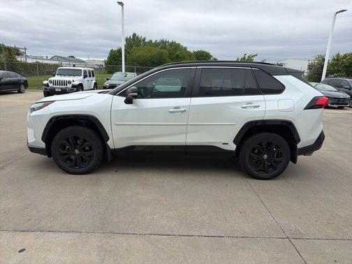 Wind Chill Pearl/Midnight Black Metallic 2023 Toyota RAV4 Hybrid SE