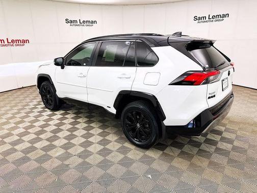 Wind Chill Pearl/Midnight Black Metallic 2023 Toyota RAV4 Hybrid SE