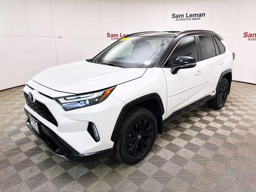 Wind Chill Pearl/Midnight Black Metallic 2023 Toyota RAV4 Hybrid SE