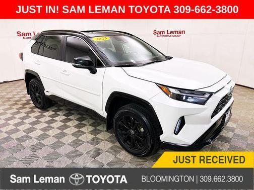 Wind Chill Pearl/Midnight Black Metallic 2023 Toyota RAV4 Hybrid SE