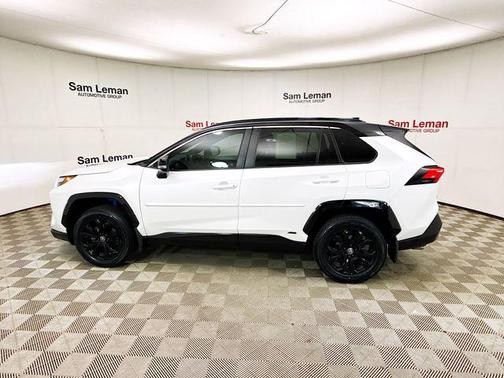 Wind Chill Pearl/Midnight Black Metallic 2023 Toyota RAV4 Hybrid SE