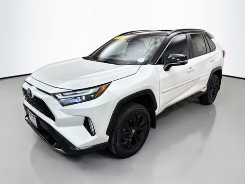 Wind Chill Pearl/Midnight Black Metallic 2023 Toyota RAV4 Hybrid SE