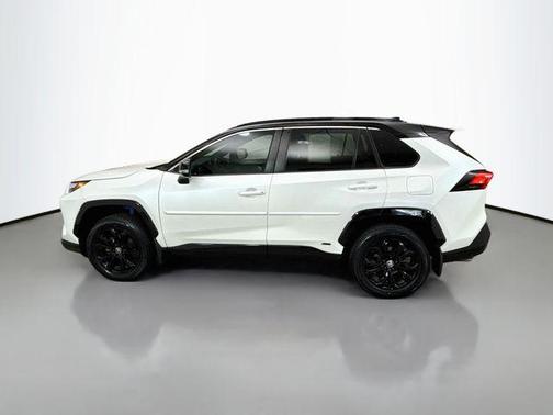 Wind Chill Pearl/Midnight Black Metallic 2023 Toyota RAV4 Hybrid SE