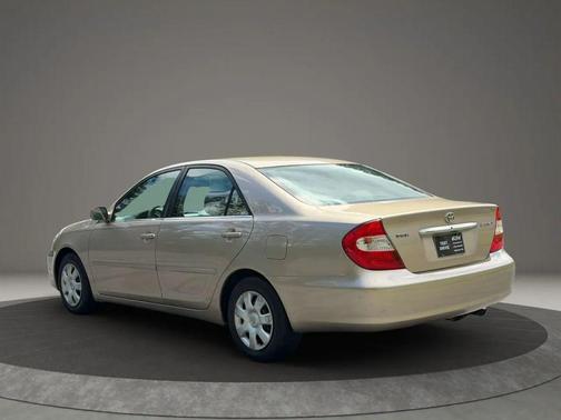 Gold 2002 Toyota Camry LE